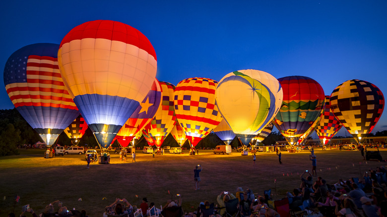 A hot air balloon festival at night