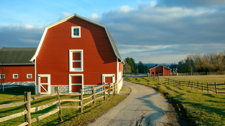 Red barn beside a wooden fence in Knox Farm State Park near East Aurora, NY