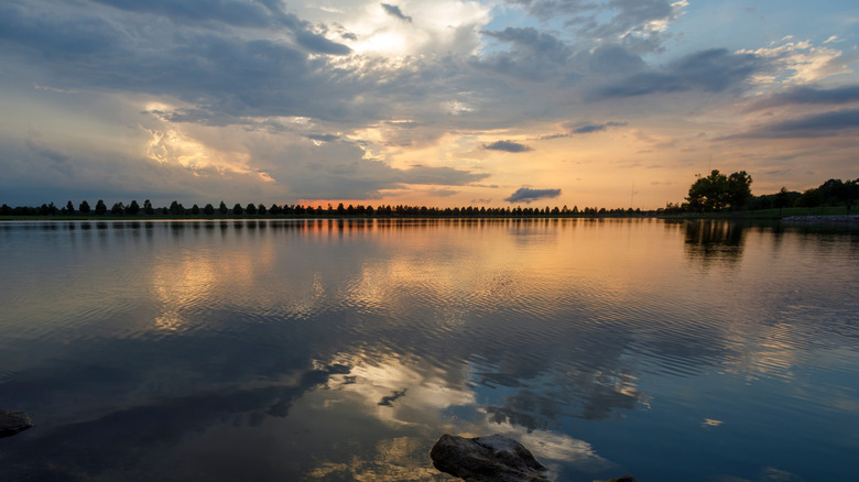 Sunset over lake in Shelby Farms Park in Memphis