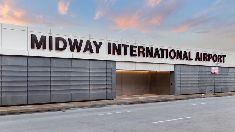 Exterior of Chicago Midway International Airport at dusk