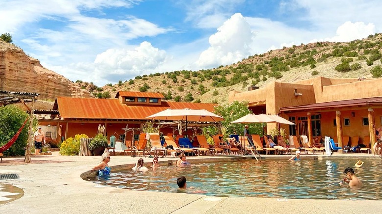 People soaking in mineral pool