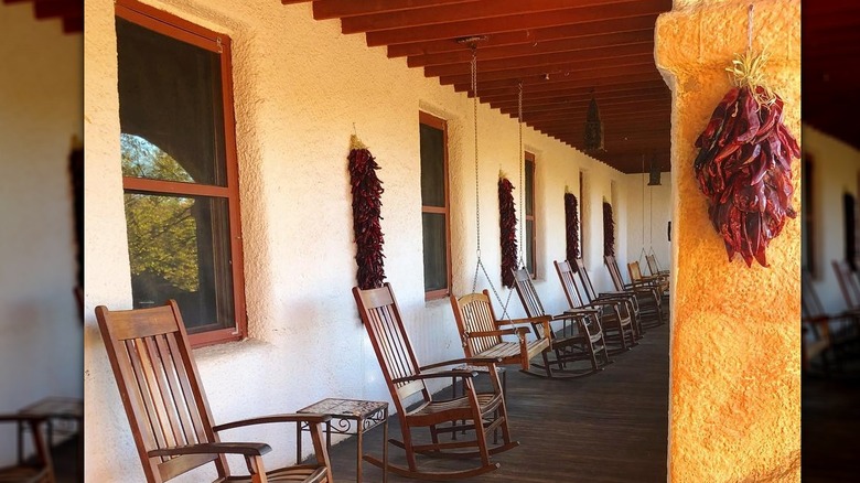 Wooden rocking chairs on porch