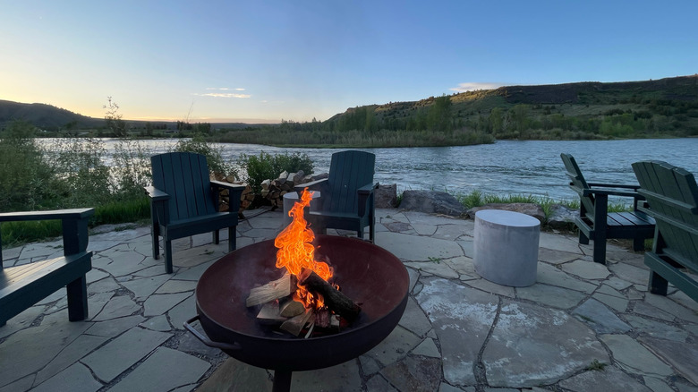 Fire dancing on a stone patio at South Fork Lodge, Swan Valley, Idaho