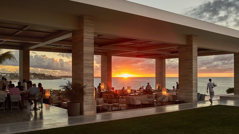 View of the sun setting at the Sunset Lounge at the Four Seasons Anguilla