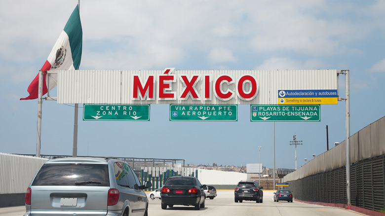 Cars driving through US/Mexico border crossing