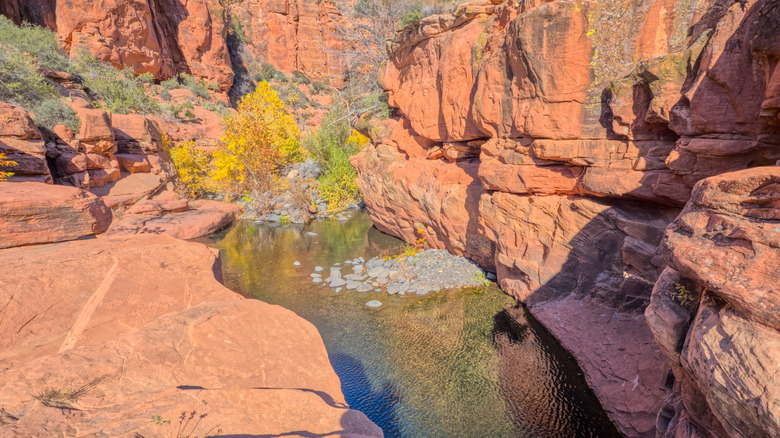 Swimming area in Beaver Creek between red rocks in Sedona, Arizona