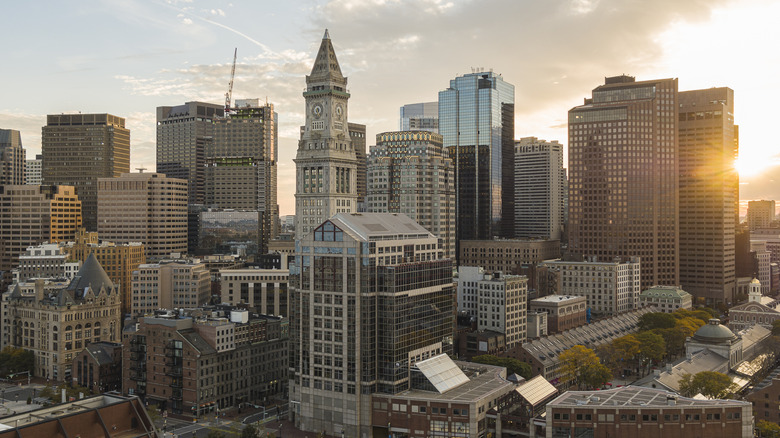 Boston's skyline at sunset, with the Custom House Tower in the center.