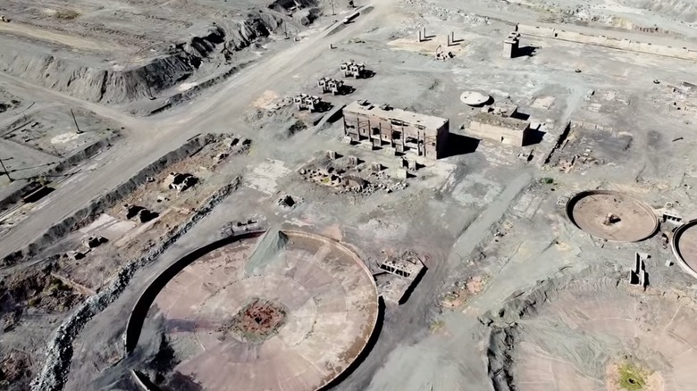 Abandoned rusted buildings in desert