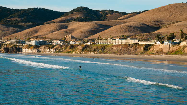Person hydro foiling at at Pismo Beach in California