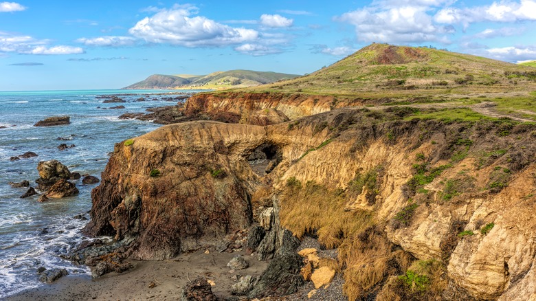 Views of the cliffs, hills, and Pacific Ocean on a clear day at Harmony Headlands State Park