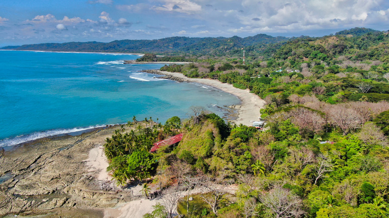 Viewpoint overlooking a turquoise beach in Santa Teresa