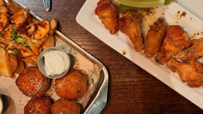Fried chicken wings and potato skins at Houlihan's