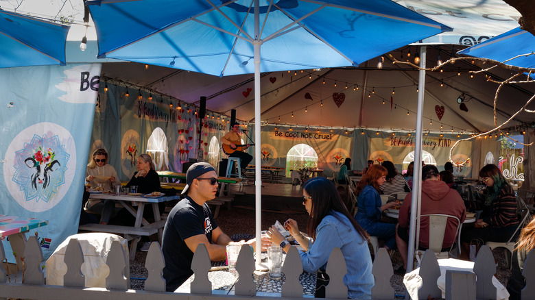 People eating and drinking outdoors in NoDa, Charlotte