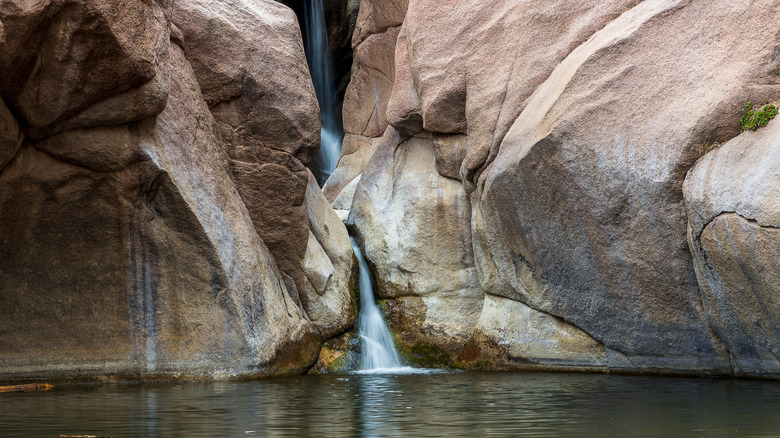 Waterfall feeds into the water of Paradise cove in Guffey Gorge