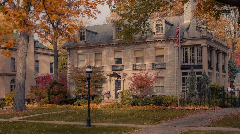 Historic Indian Village house in Detroit with fall foliage