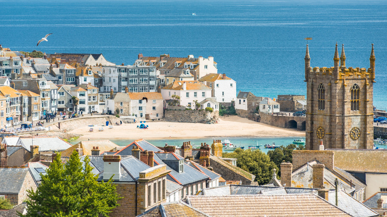 View of quaint buildings lining the beach of St. Ives, Cornwall.