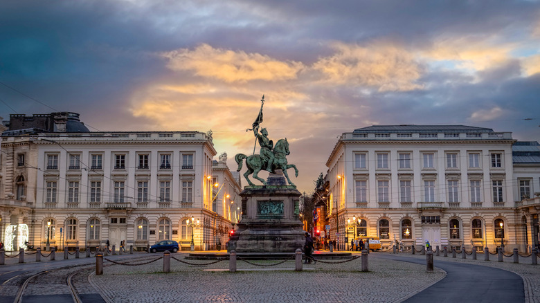 A statue and buildings in the 18th-century Place Royale