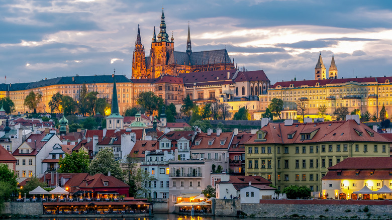 Prague Castle with St. Vitus Cathedral over Mala Strana at sunset, Czech Republic