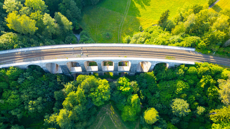 Sychrov Railway Bridge in Czechia standing over the dense forest