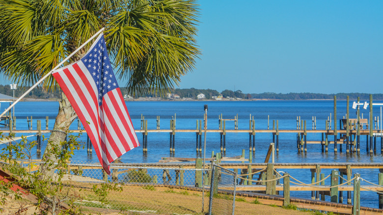 American Flag and shoreline of Hammock Bay, Freeport, Walton County, Florida