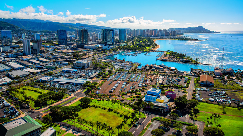 Aerial photo of the downtown skyline and the Makiki-Tantalus area in Honolulu, Hawaii.