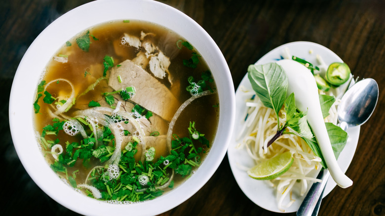 A picture of a bowl of pho noodle soup