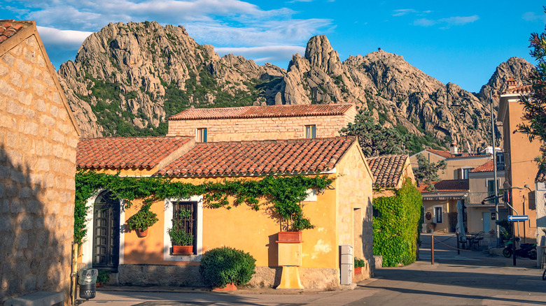 charming street in San Pantaleo with granite hills in the background