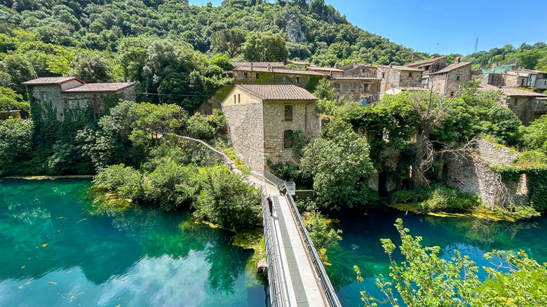 Panoramic view of Stifone medieval village and bridge over Nera River in Umbria, Italy