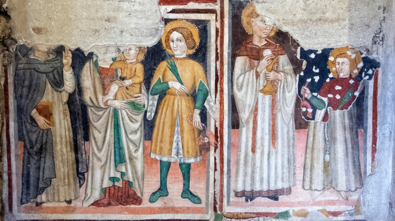 Hand painted frescos by unknown medieval painter found in interior of the medieval church of Santa Maria Impensole, discovered in the 1960s in the Narni Underground complex in Umbria, Italy