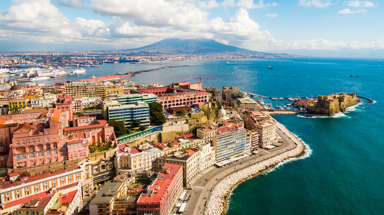 The Naples coastline, with the Castel dell'Ovo, against the backdrop of Mount Vesuvius, Italy