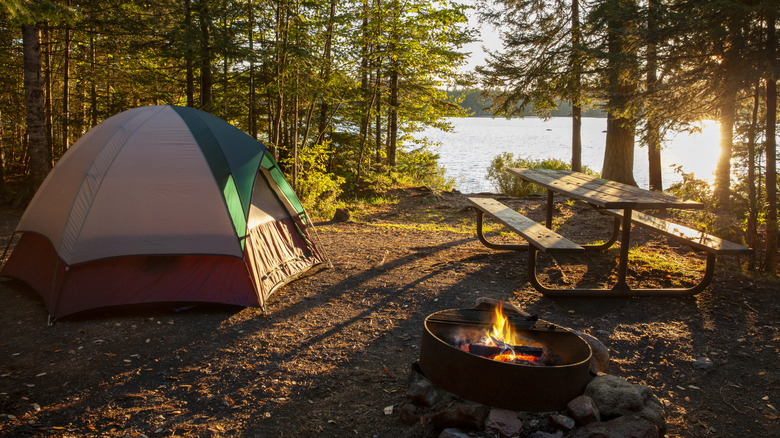 Tent campsite by lake