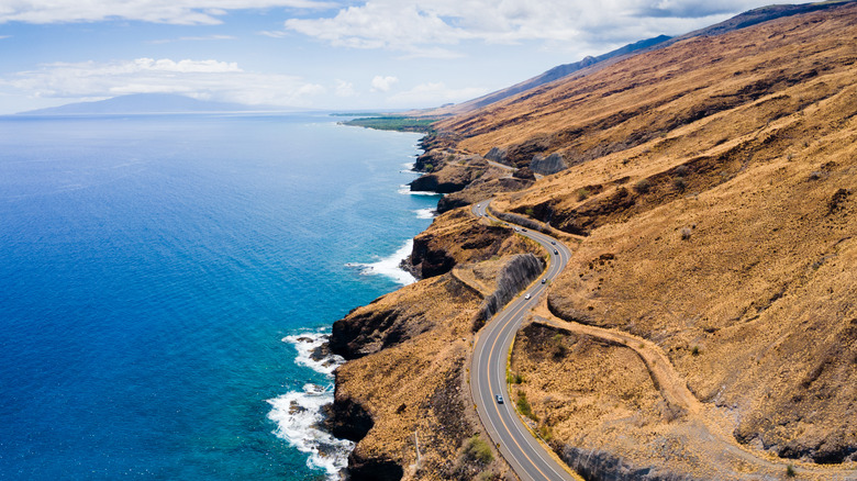 the winding cliffside road of the Pali Highway near Lahaina