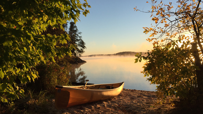 Canoe on Basswood Lake at sunrise
