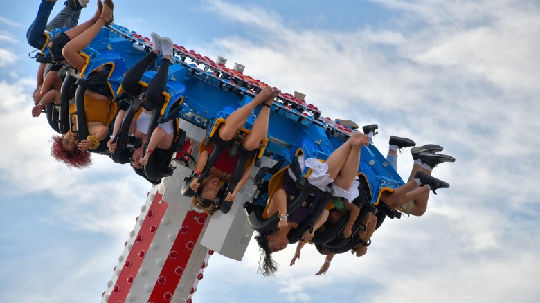Photo of people upside down on a ride at Western Playland Amusement Park