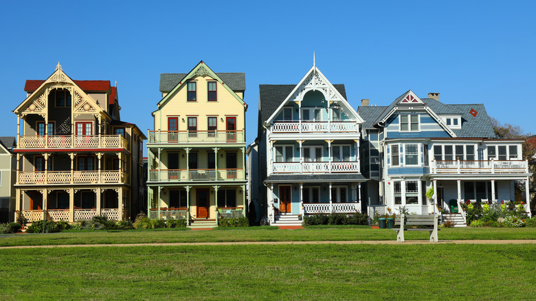 Exteriors of four Victorian homes on a street in Ocean Grove