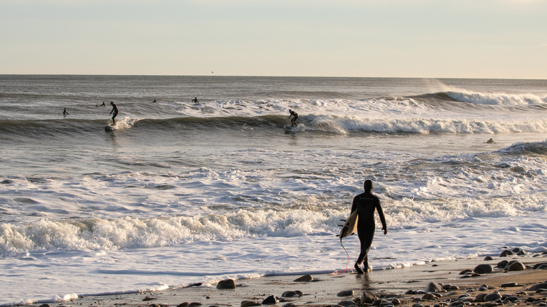 Surfers riding the waves in Montauk, NY