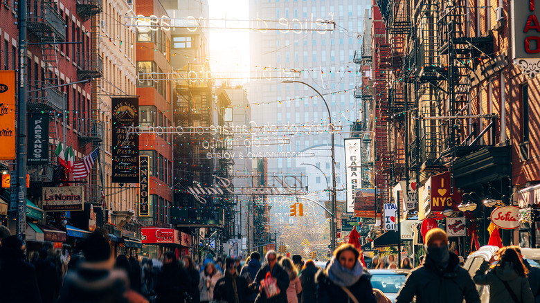 A Manhattan street lined with shops and restaurants