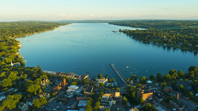 aerial view of the town of Skaneateles with Skaneateles Lake beyond it
