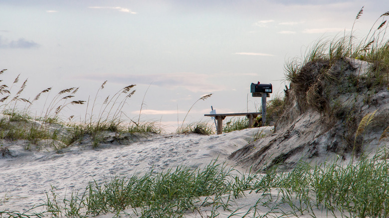 The Kindred Spirit Mailbox among dunes at Sunset Beach, North Carolina