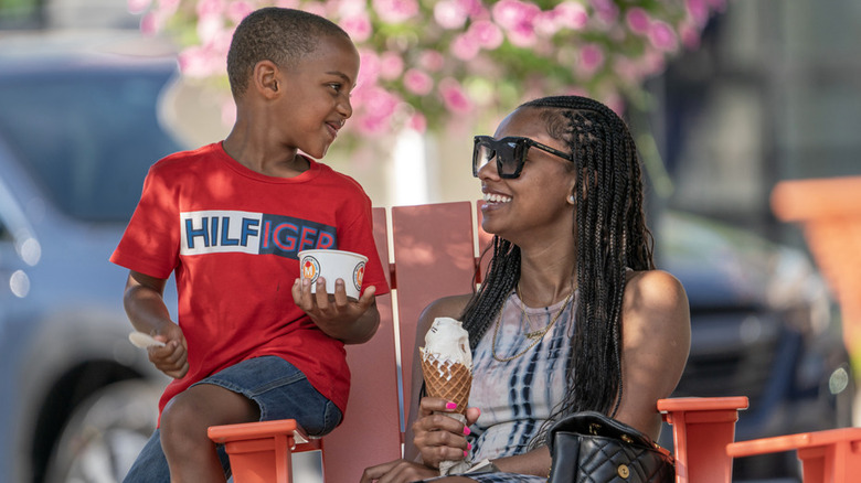 A woman and child enjoying ice cream from Mitchell's ice cream