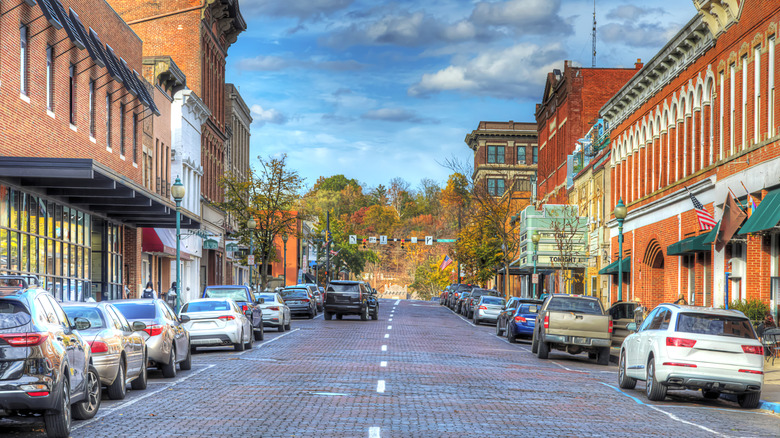 Cars lined up on Athens street in autumn