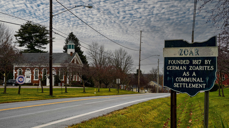 Zoar Village sign that reads, "Zoar: Founded 1817 by German Zoarites as a communal settlement." in Zoar, Ohio.