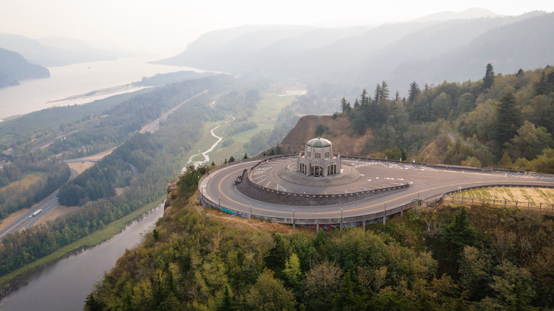 Aerial view of the Vista House overlooking the gorge on a misty morning