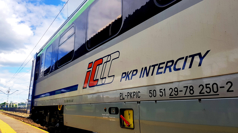 Close-up of Polish train with PKP Intercity logo.