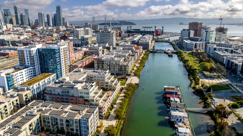 Mission Creek San Francisco houseboats in the Mission Bay neighborhood from above with Oracle Park in background