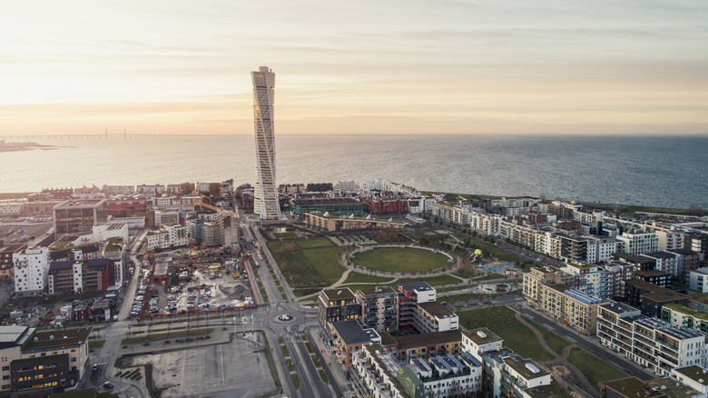 Aerial view of Malmo, Sweden's skyline featuring the famous modern Turning Torso building