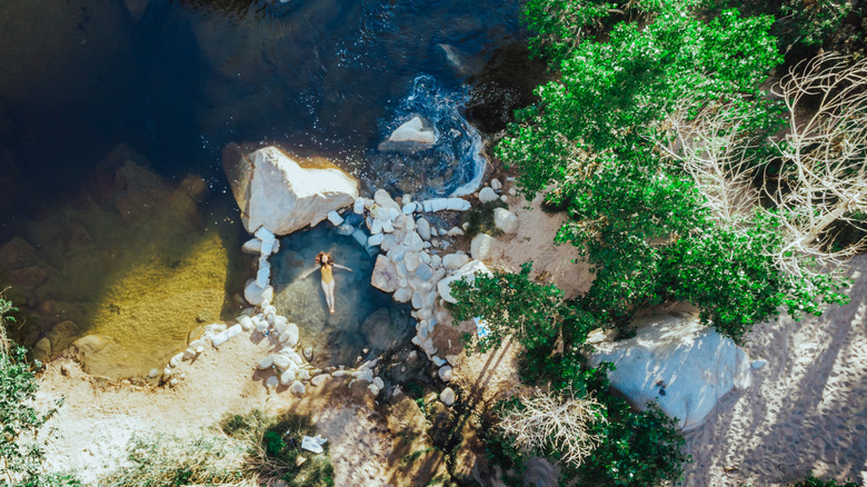 Aerial shot of bather in Deep Creek Hot Springs