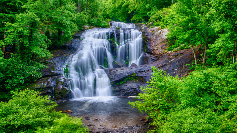 Bald River Falls with lush green foilage surrounding near Tellico Plains, TN.