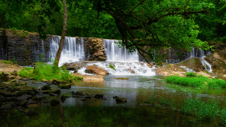 Water flowing over Amis Dam in Rogersville, Tennessee