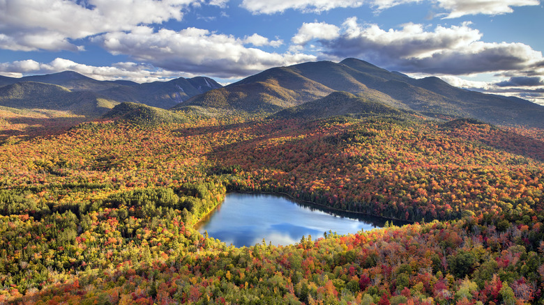 The view of Heart Lake from Mount Jo, surrounded by colorful autumn trees